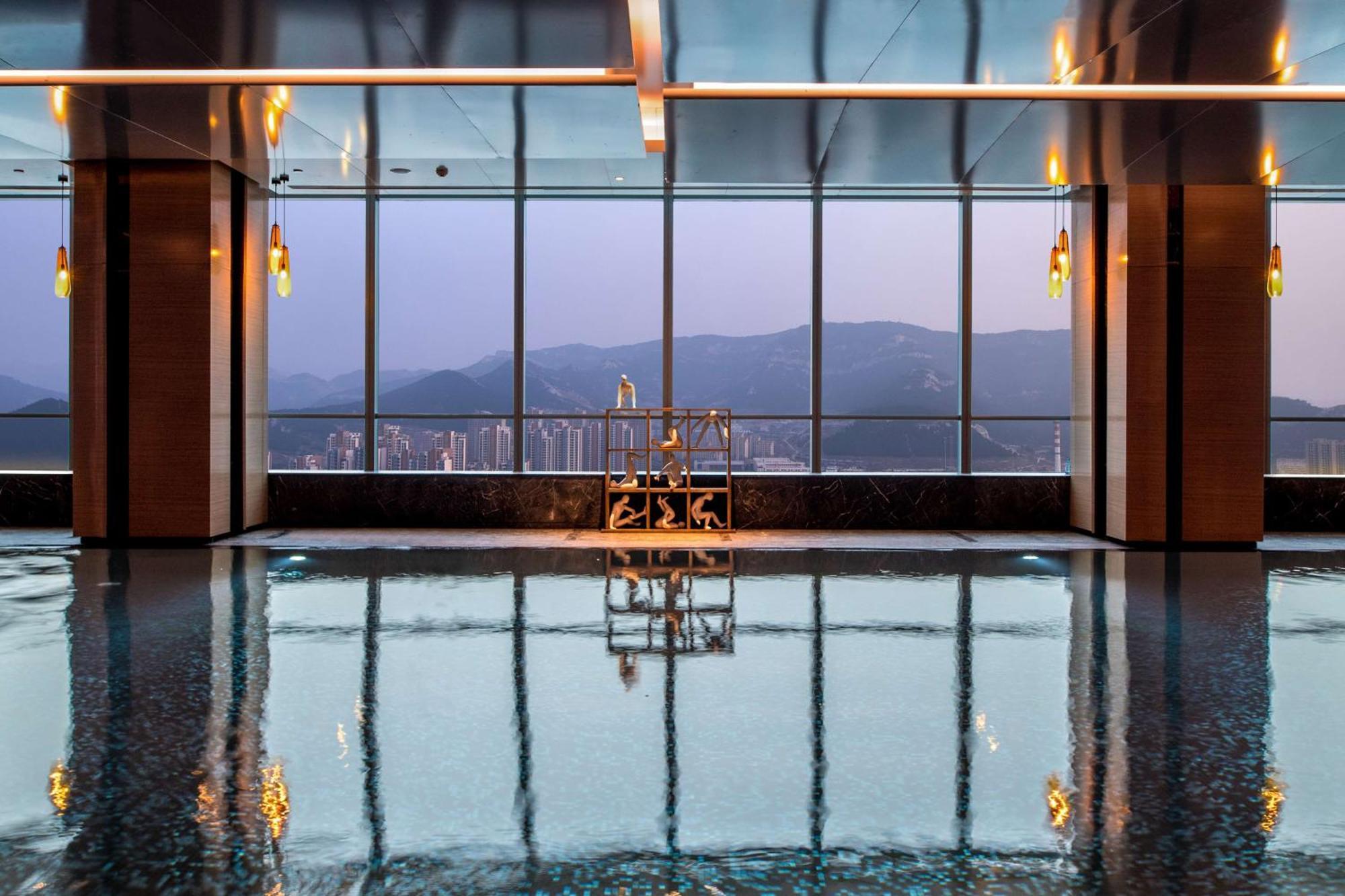 ฮิลตัน จี้หนาน เซาท์ โฮเต็ล แอนด์ เรสซิเดนซ์ Hotel จี่หนาน ภายนอก รูปภาพ